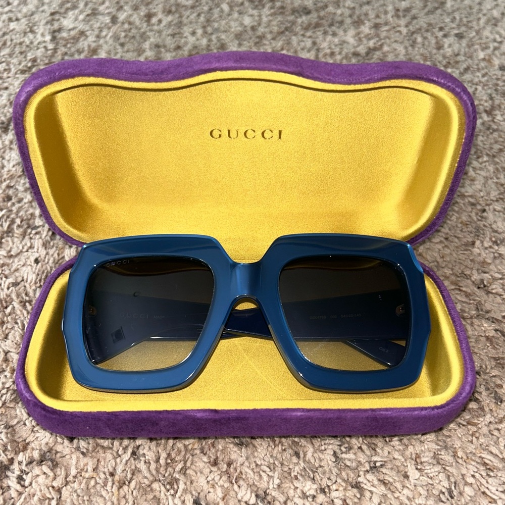 Oversized blue Gucci sunglasses